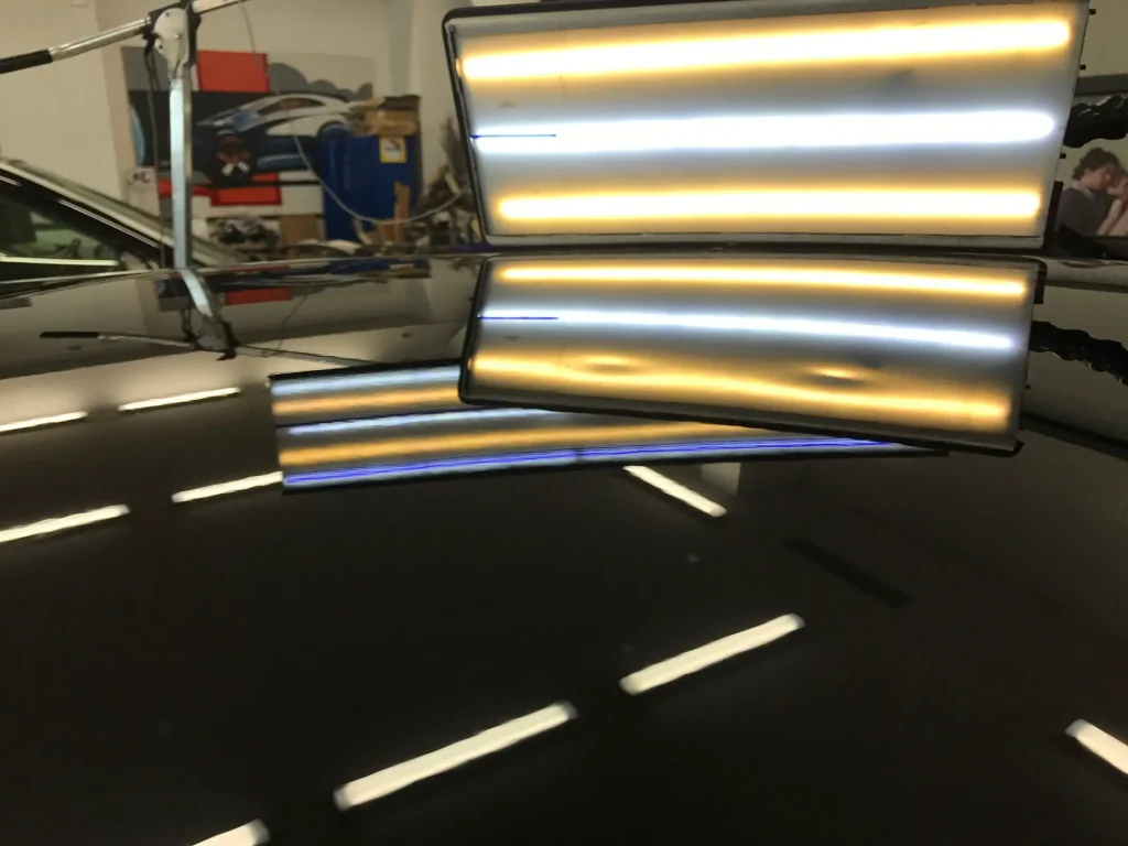 Réparation grêle voiture en France & Europe : débosselage sans peinture dans notre garage carrosserie spécialisé.